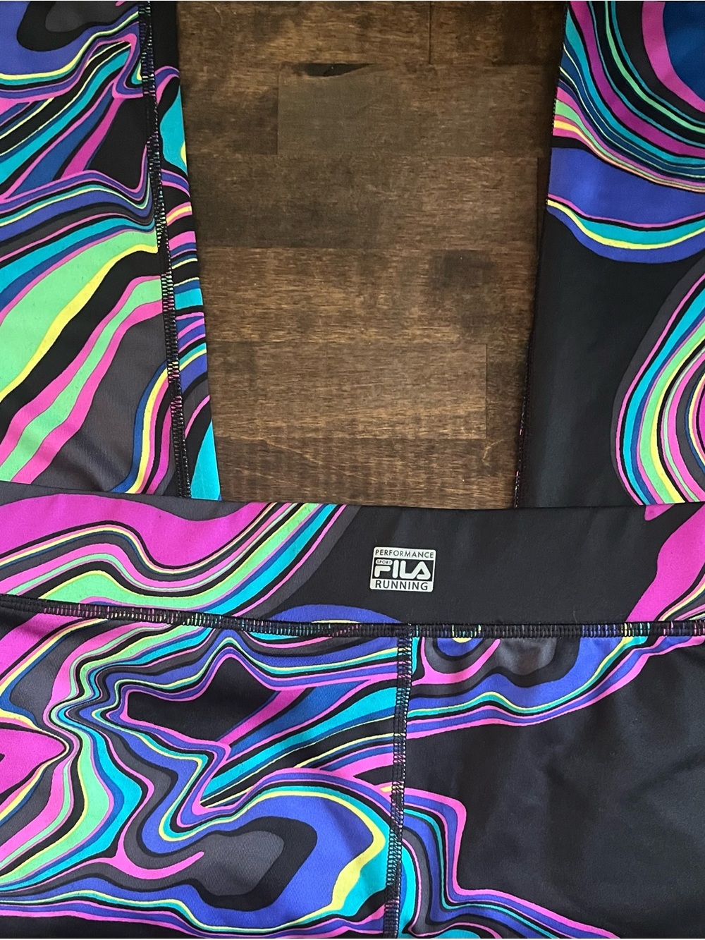 NWOT Fila Running Leggings black neon swirls. Size M
